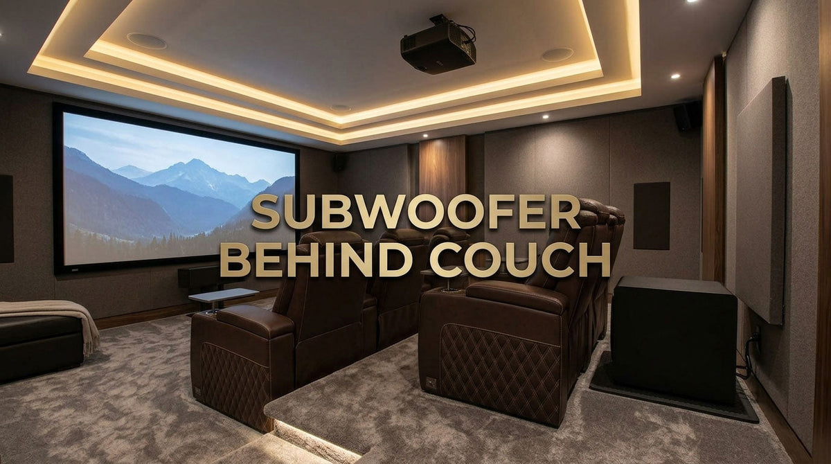 Subwoofer positioned behind a row of home theater recliners with safe seating clearance