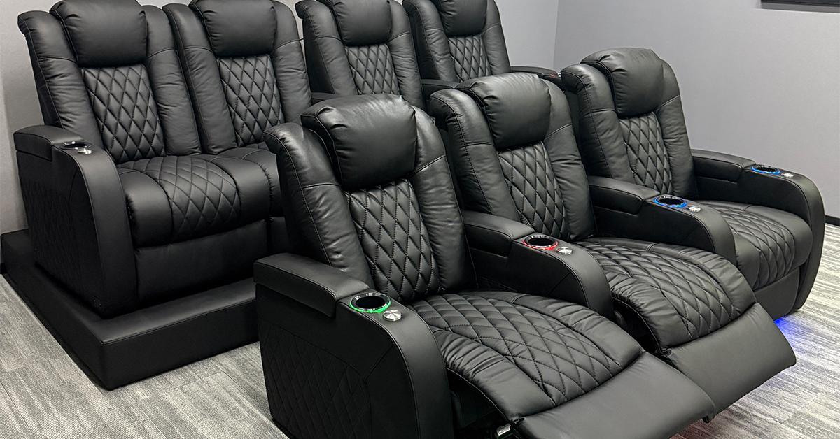 Luxury black leather home theater seating with cup holders