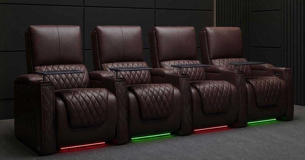 Brown leather recliner sofa with tufted back and wide armrests