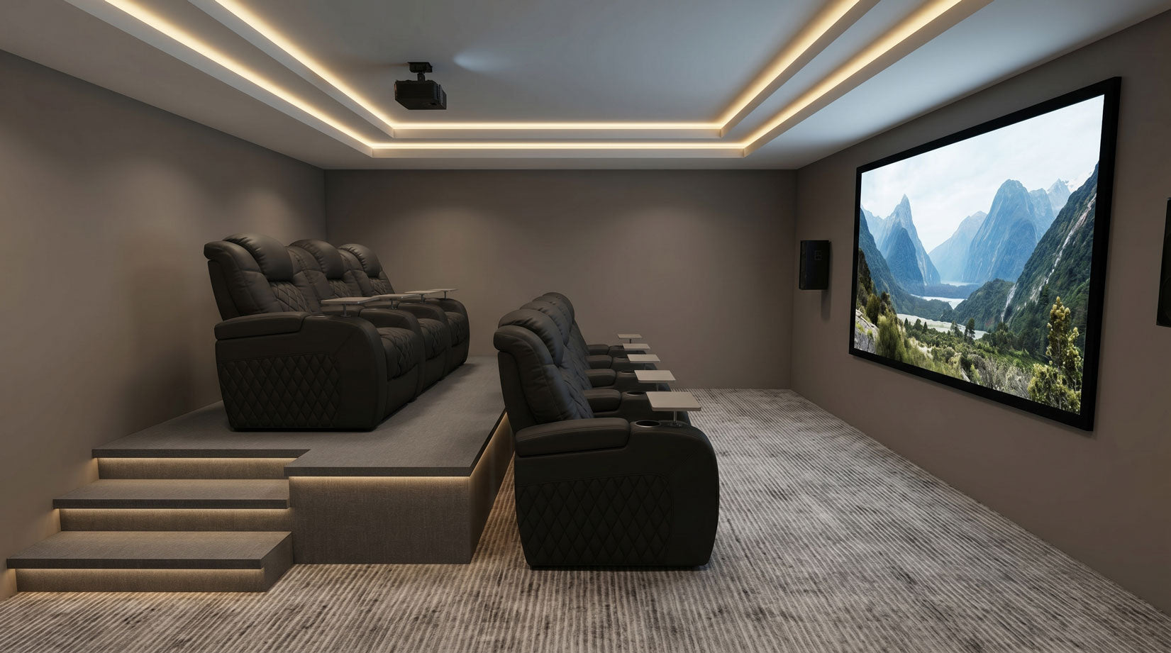 Two rows of stadium seating in a home theater room with recliners