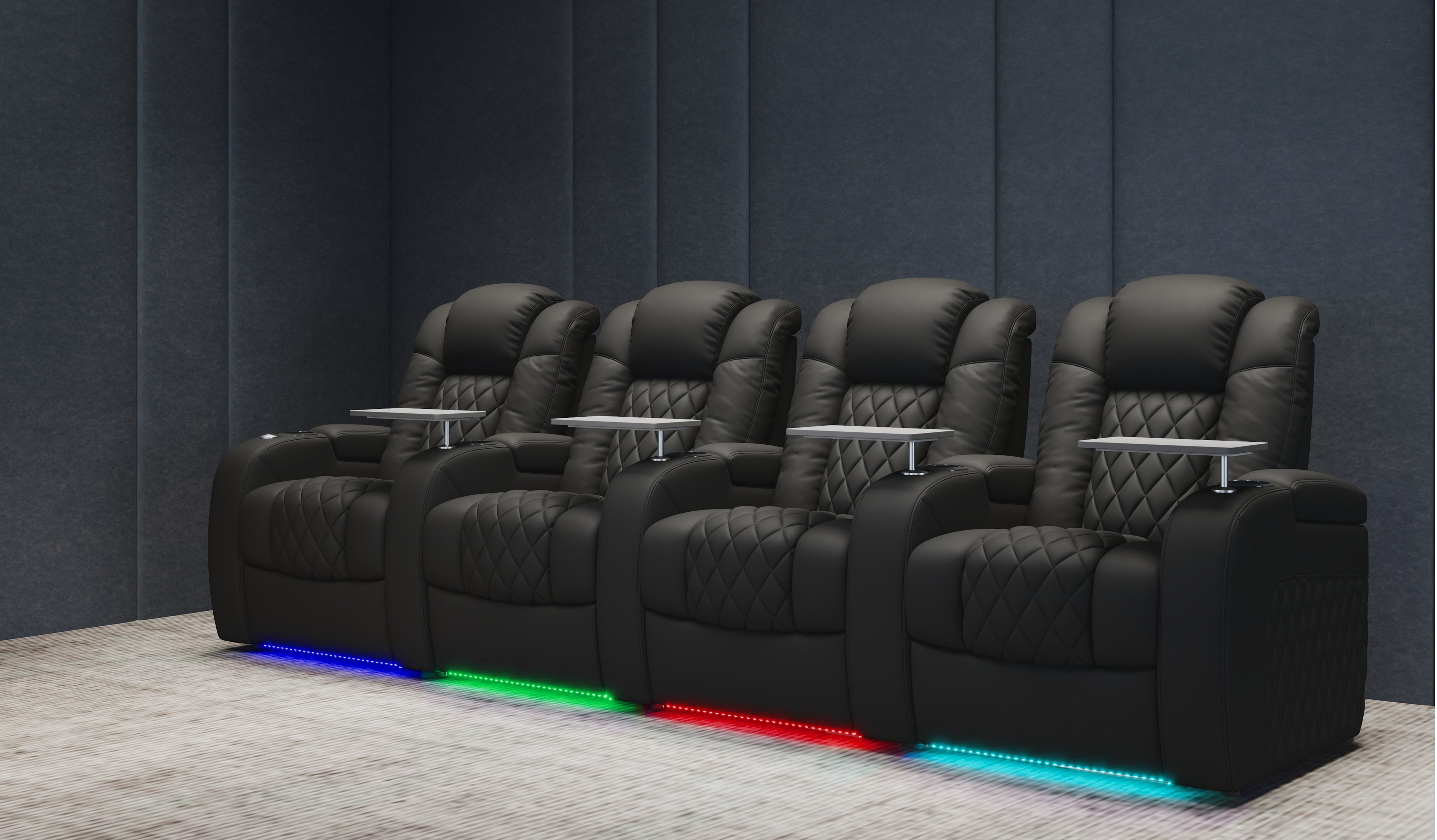 Row of black home theater recliners with LED base lights and tray tables