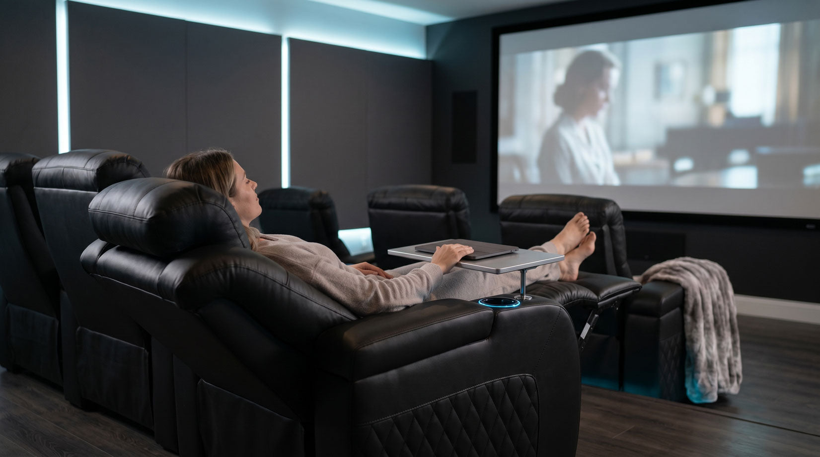 Zero gravity recliner in a modern home theater room