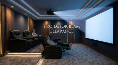 Two rows of reclining theater seats below a ceiling-mounted projector beam in a modern home theater.