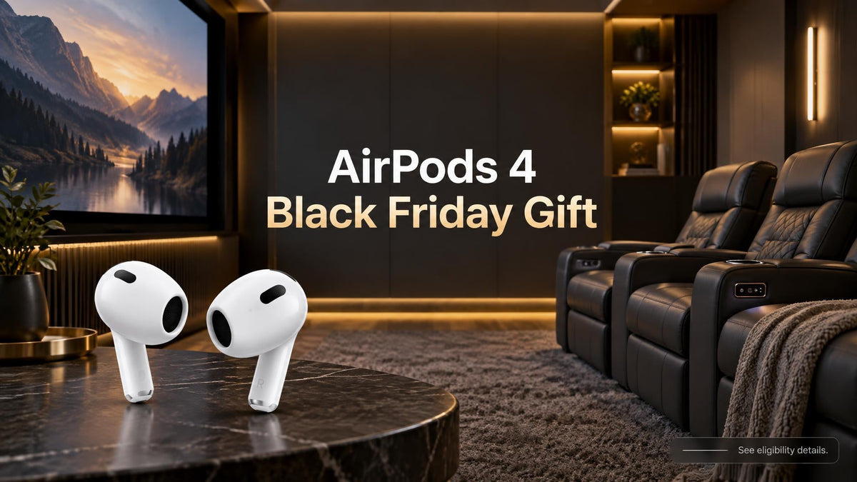 AirPods 4 earbuds beside reclining theater seating in a contemporary media room