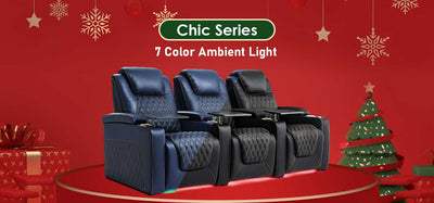 A promotional image for a "Luxury Series" home theater seating collection showing three power recliners in a holiday-themed setting.