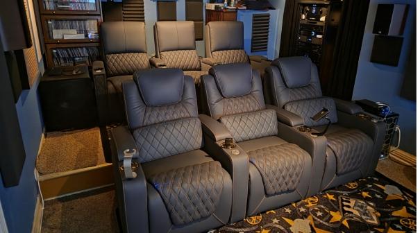 Tiered grey leather home theater recliners with diamond stitching