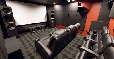 Home theater with black leather seating and large speakers