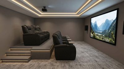 Two rows of stadium seating in a home theater room with recliners