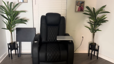 single power recliner chair with tray table in living room