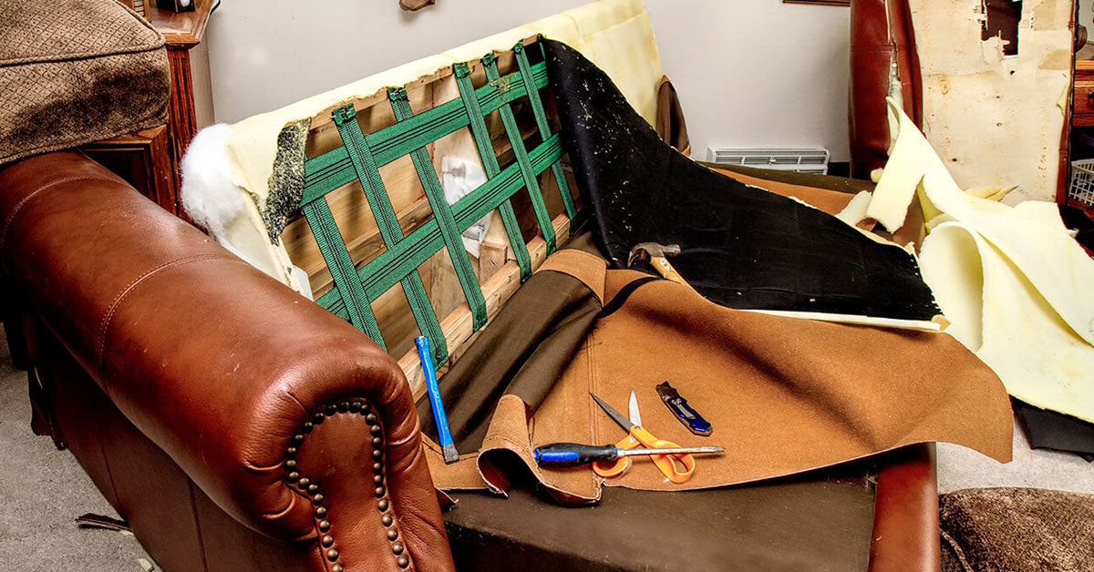 Reupholstering a sofa with new fabric and materials