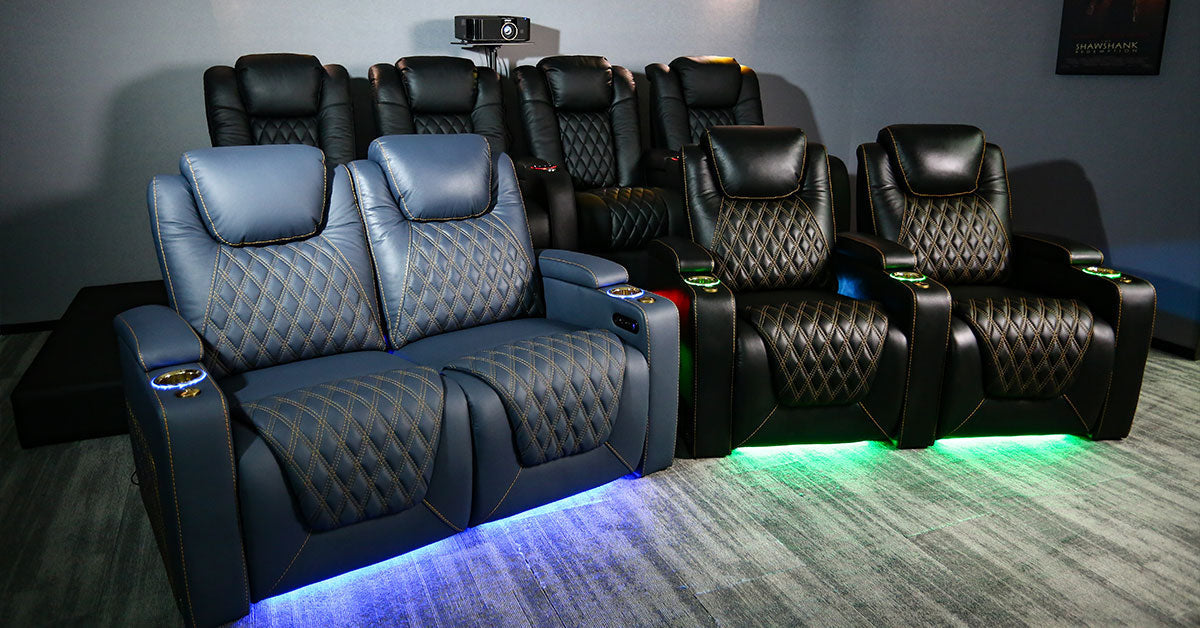 Modern home theater seating with LED lighting and sleek black upholstery