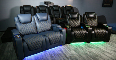 Modern home theater seating with LED lighting and sleek black upholstery
