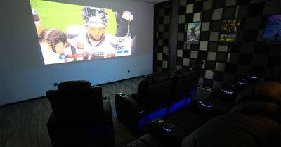 Home theater room projecting live football game