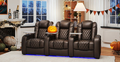 Three home theater recliners with Halloween fall decorations and LED lights
